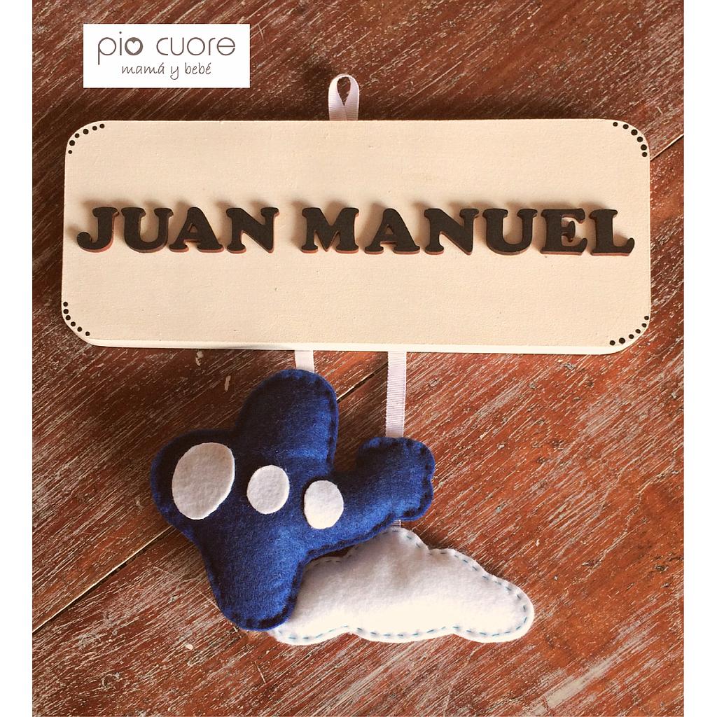 Juan Manuel en azul y blanco